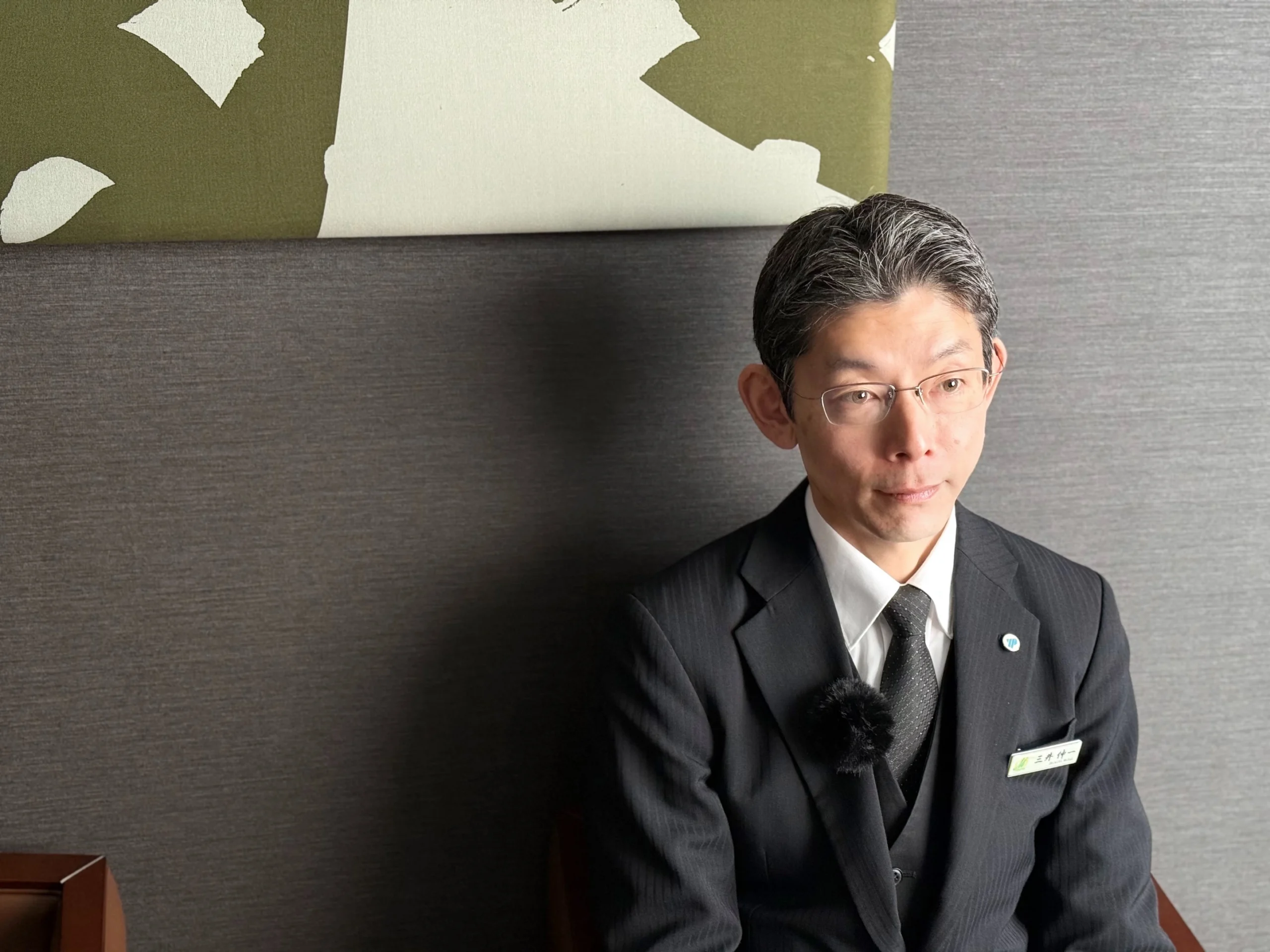 入社の経緯について語る三井伸一さん